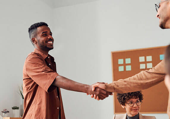 men shaking hands in agreement